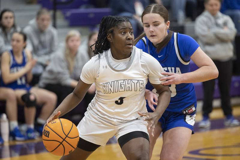 Kaneland’s Amani Meeks looks to make a play against Geneva Monday, Feb. 16, 2026, in the Class 3A regional semifinals.