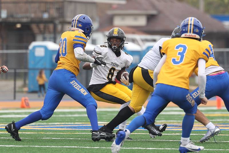 Joliet West’s Taivaughn Johnson makes a cut against Joliet Central on Saturday, Sept. 28, 2024 in Joliet.