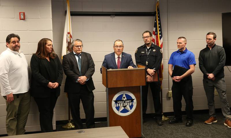 (From left) Brian LeBrau, investigator for the La Salle County State's Attorney's Office, Laura Hall assistant La Salle County States Attorney, Greg Sticka, Chief deputy assistant LaSalle County States Attorney,  Joe Navarro, La Salle County States Attorney, Sgt. Robert Wood Deputy Chief of the Streator Police Department, Ryne Reel Streator Police investigator, and Eric Price, La Salle County States Attorney investigatior give a press conference involving involving Joshua Casey, who is charged with concealment of a homicidal death on Monday, March 10, 2025 at the La Salle County Government Complex in Ottawa.