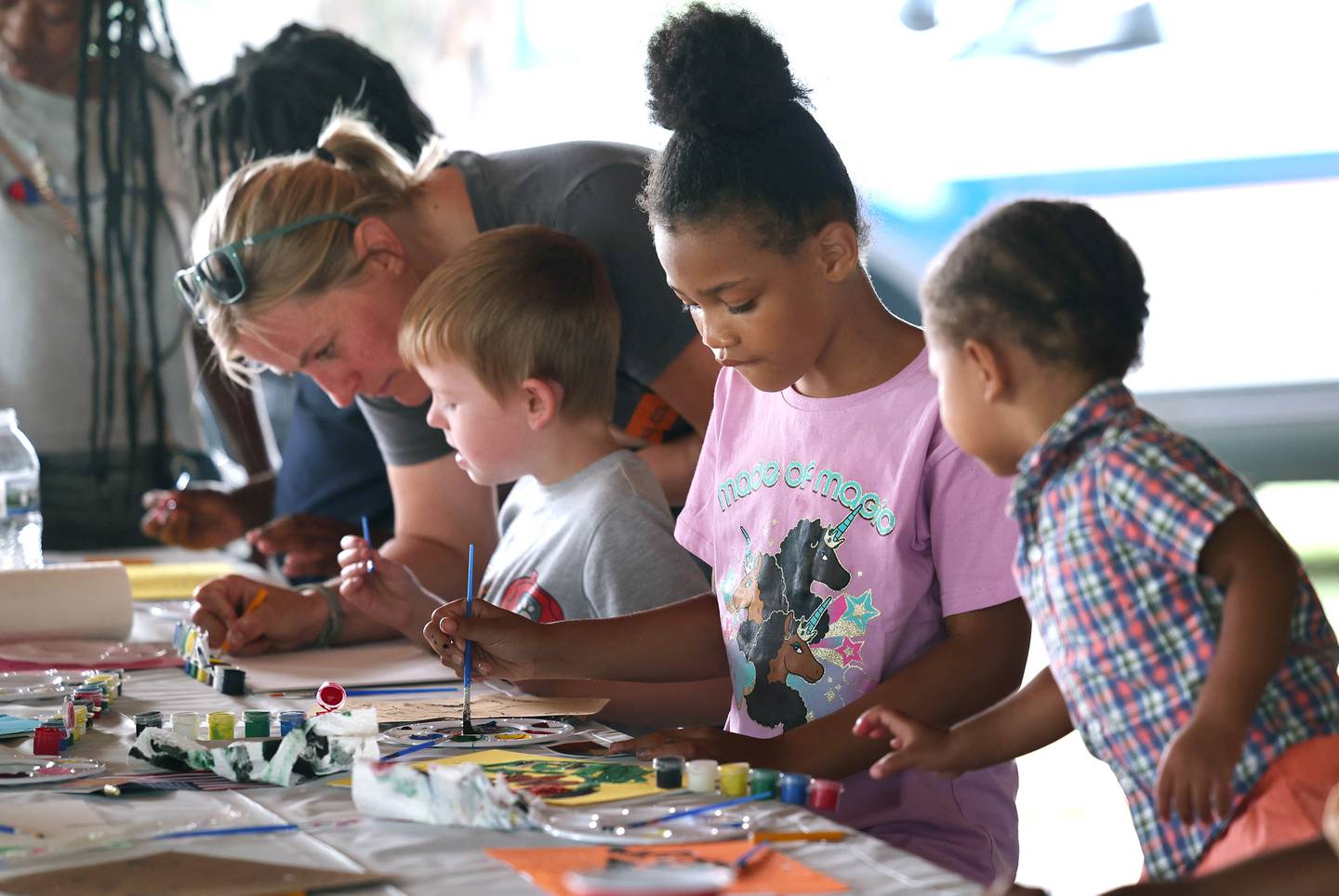 Participants do some watercolors during Fun Jam in the Park Tuesday, June 27, 2023, at Welsh Park in DeKalb. Fun Jam in the Park offers constructive activities for kids on Tuesday and Thursday through August 8th from 5-7 p.m. at various parks in DeKalb.