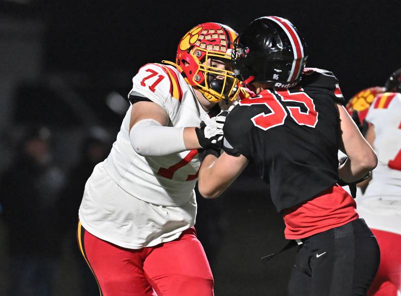 Batavia's Ryan Myers (71) blocks Lincoln-Way Central's Aiden Hennings (95) during the Class 7A semifinal playoff game on Saturday, Nov 23, 2024 at New Lenox. (Dean Reid for Shaw Local News)