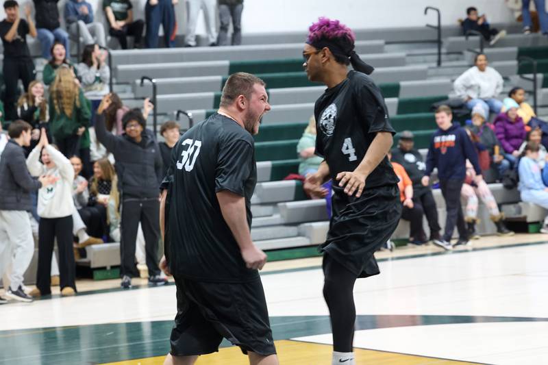 River Valley Special Rec player Matthew Brock, left, celebrates hitting a 3-pointer at the buzzer at halftime with teammate Nick Avignone in their game against Lincolnway Special Recreation Association on Friday, Jan. 30, 2026.