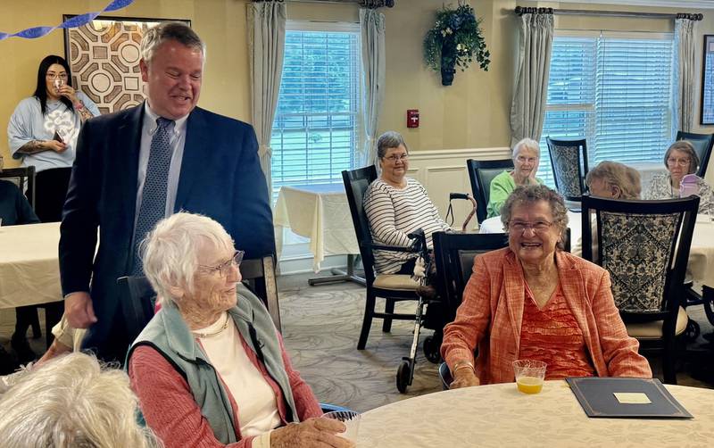 Mayor Clint Hull honored Arvena "Vee" Guynnn (right) with a proclamation at her 100th birthday party on Wednesday, May 28, 2025, at River Glenn of St. Charles.