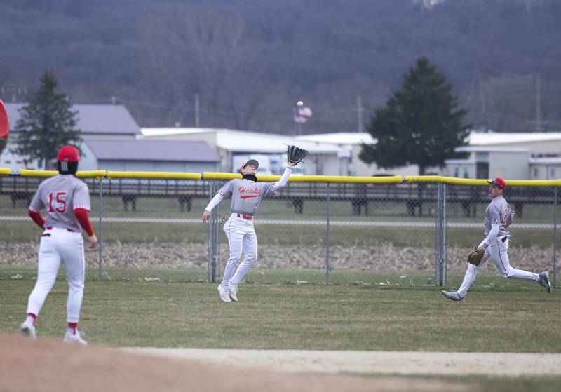 Oregon’s Avery Lewis hauls in a deep fly ball against Amboy Thursday, March 21, 2024 in Oregon.