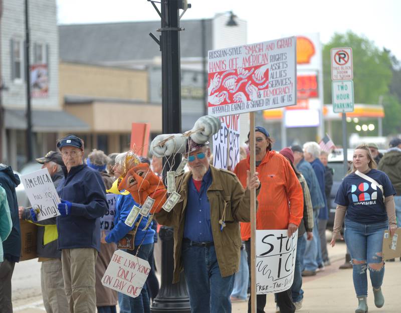 Attendees displayed a variety of signs at the May Day Rally on Thursday, May 1, 2025 in Oregon.