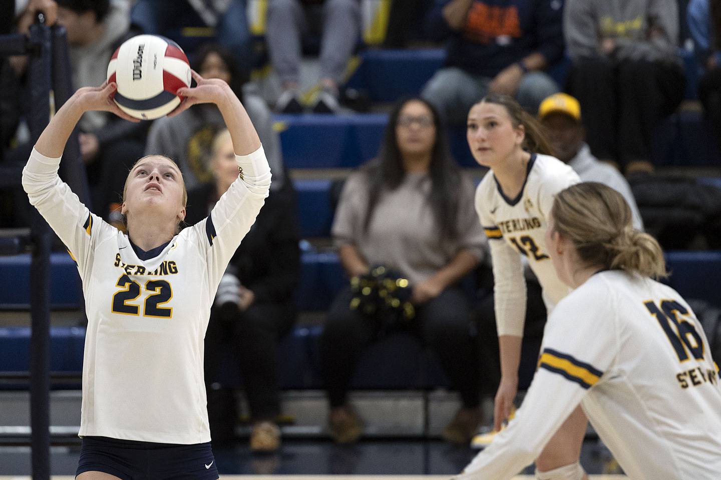 Sterling’s Madison Birdsley sets the ball against Morris Thursday, Oct. 30, 2025, in the Class 3A volleyball regional.