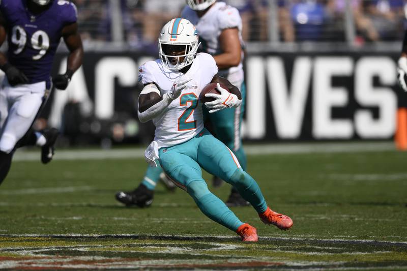 Miami Dolphins running back Chase Edmonds (2) in action during the second half of an NFL football game against the Baltimore Ravens, Sunday, Sept. 18, 2022, in Baltimore. (AP Photo/Nick Wass)