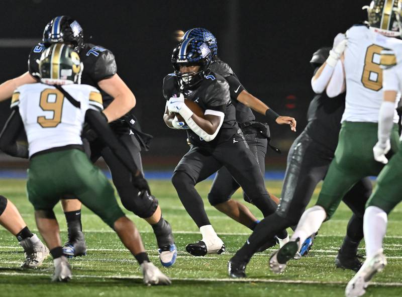 Lincoln-Way East's Zion Gist (7) in action during the IHSA Class 8A Quarterfinals game against Stevenson on Friday, Nov. 15, 2024, at Frankfort. (Dean Reid for Shaw Local News)