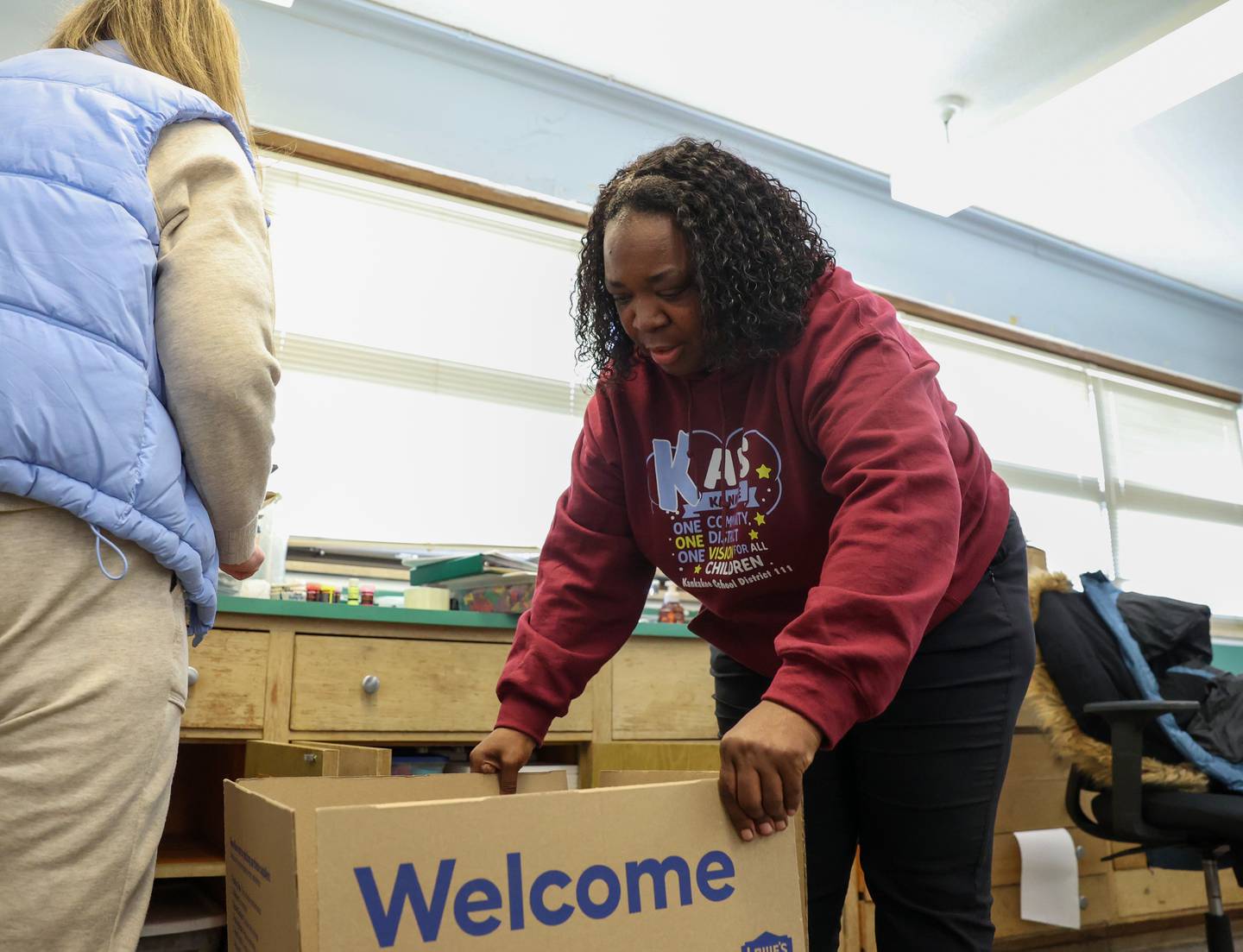 Kindergarten teacher Frances Noble packs up her classroom with fellow teacher Lisa Zarate at Edison Primary School in Kankakee, where she has taught for 25 years, on Jan. 7, 2026, following the school's emergency closure by Kankakee School District 111.