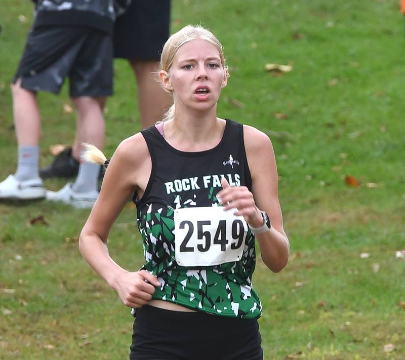 Rock Falls' Kat Scott sprints to the finish line at the Amboy Columbus Day Cross Country Invitational held at Shady Oaks Country Club near Amboy on Monday, Oct. 13, 2025. She finished 18th.