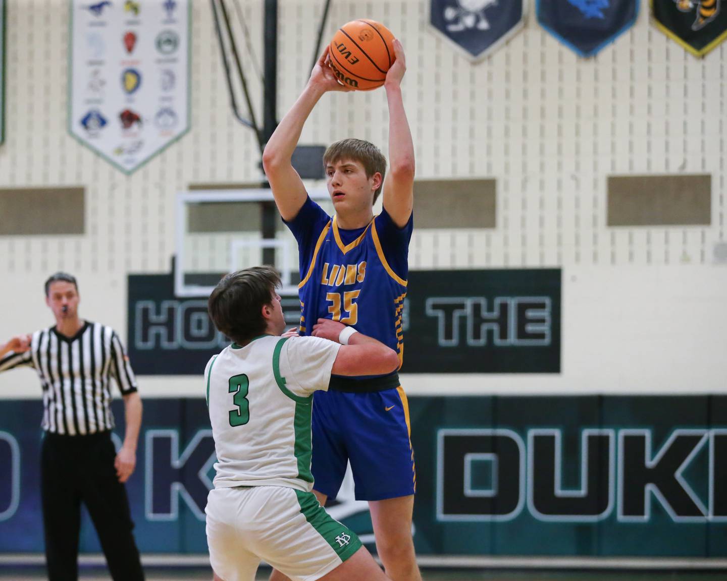 Lyon's Ian Polonowski (35) looks to pass during their basketball game between Lyons at York. Jan 10, 2025 in Elmhurst.