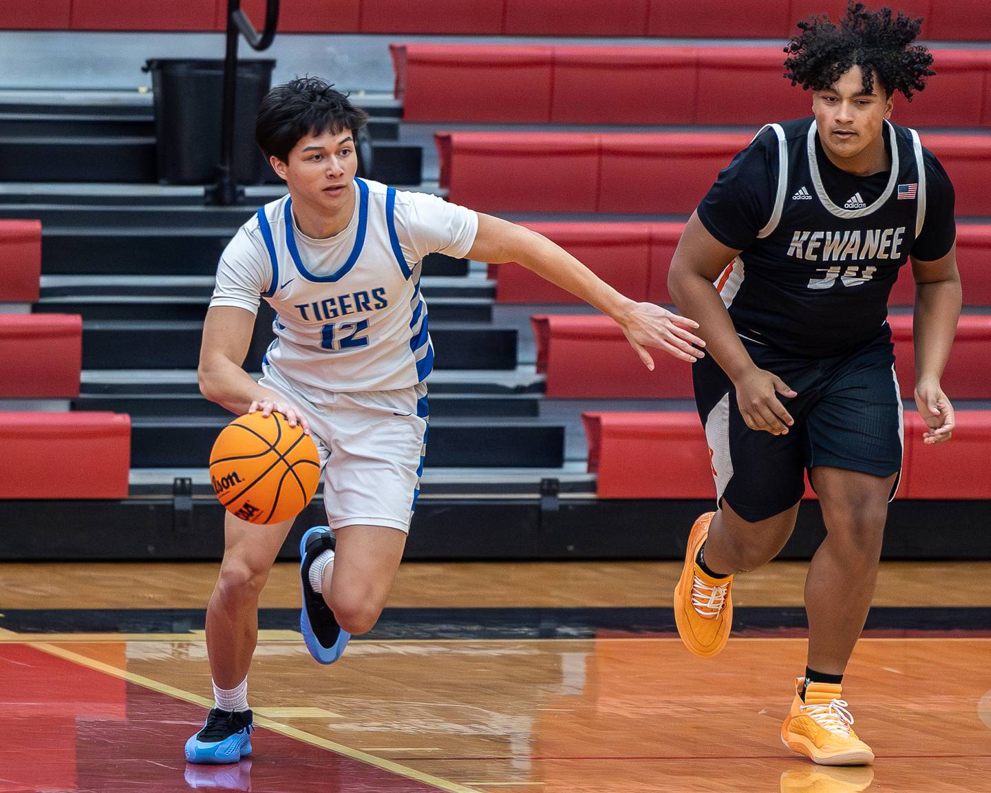 Daniel Barnes (12) of Princeton dribbles ball up court during the Colmone Classic on Saturday, December 13, 2025 at Hall High School in Spring Valley.