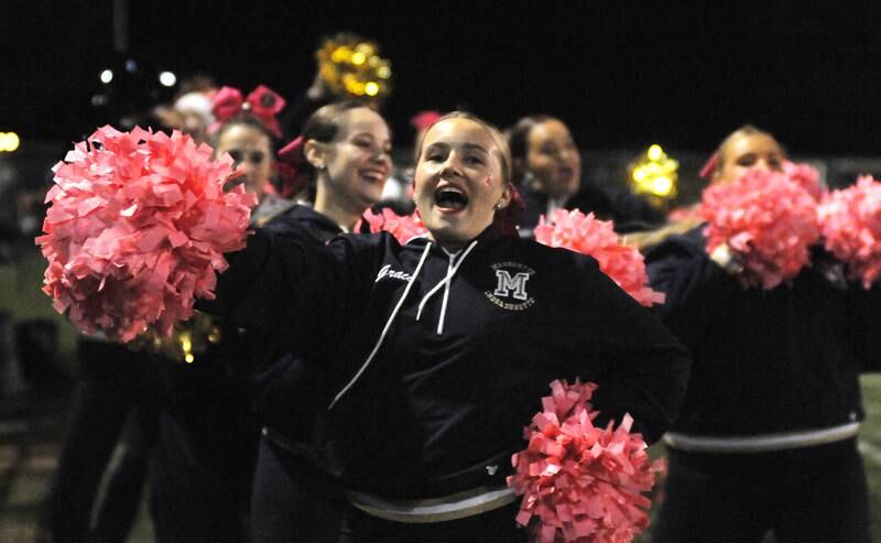 Marquette poms member Grace Dose performs on the sideline at Gould Stadium on Friday, Oct. 6, 2023.