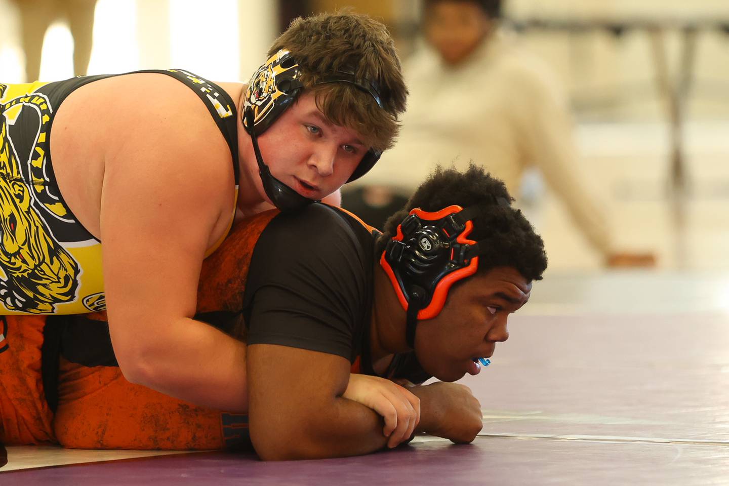 Joliet West’s Wyatt Schmitt works over Normal’s Daishawn Crawford in the 285lb 3rdt place match at the Class 3A Joliet West Regionals. Saturday, Feb. 5, 2022, in Joliet.