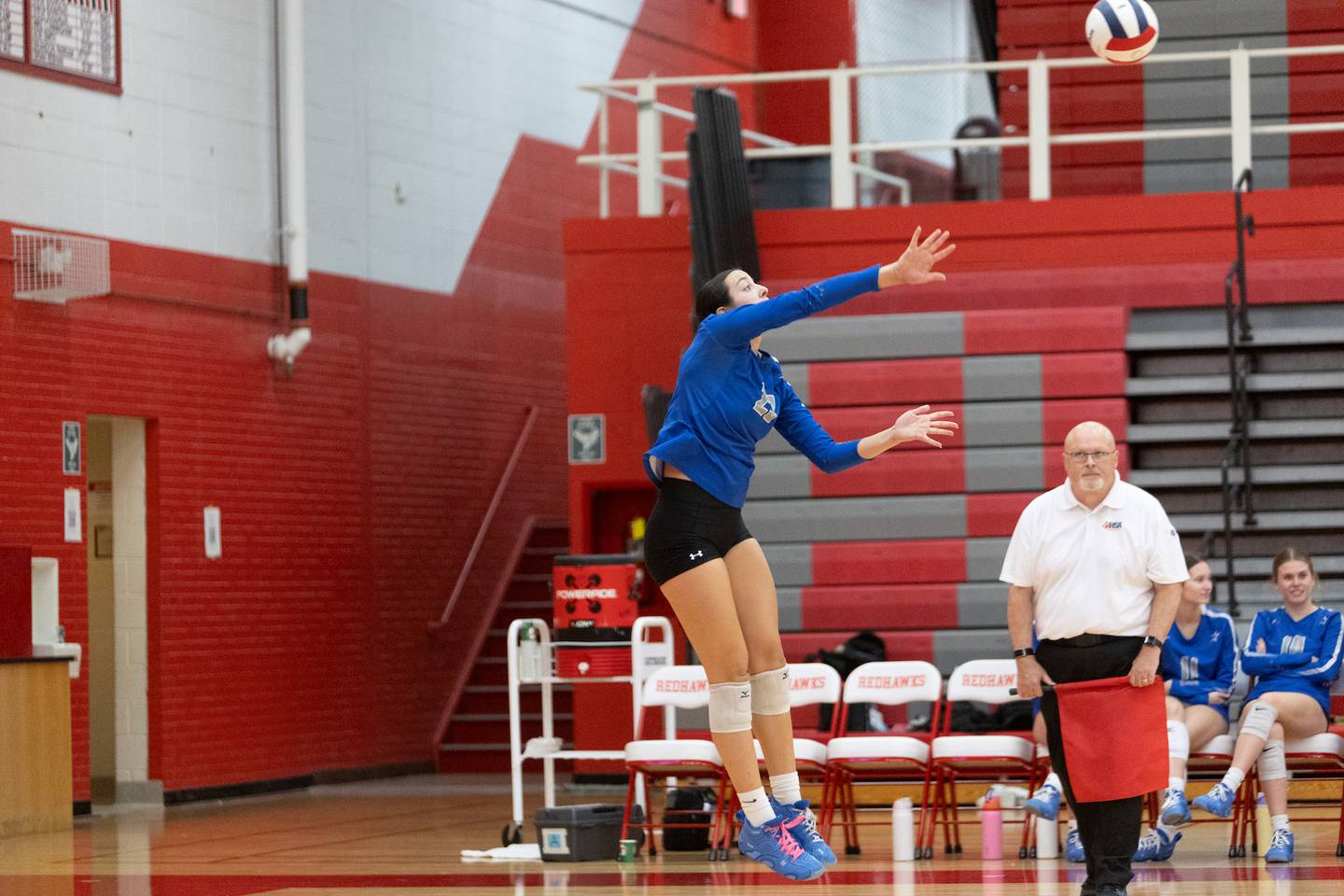 St. Charles North's Haley Burgdorf serves the ball against Naperville Central at the Class 4A Regional Final on Thursday, October 30,2025 in Naperville.