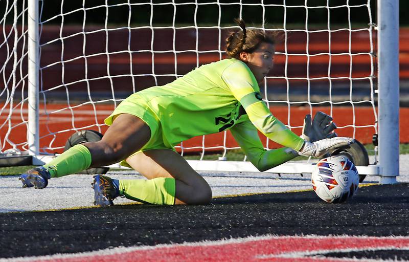 Crystal Lake Central's Addison Cleary stops aLake Forest shootout kick during a Class 2A Deerfield Sectional semi-final match on Tuesday, May 21, 2024, at Deerfield High School.