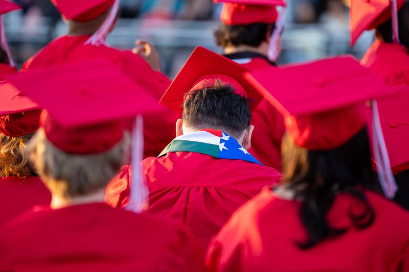 (center) Jose Rodriguez bows head on Friday May 23, 2025 at Ottawa High School in Ottawa.