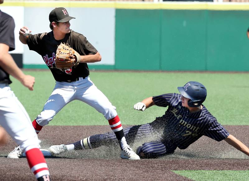 Lemont's Shea Glotzbach tries to break up a double play as Highland's Brayden Bircher throws to first during their Class 3A state semifinal game Friday, June 7, 2024, at Duly Health and Care Field in Joliet.