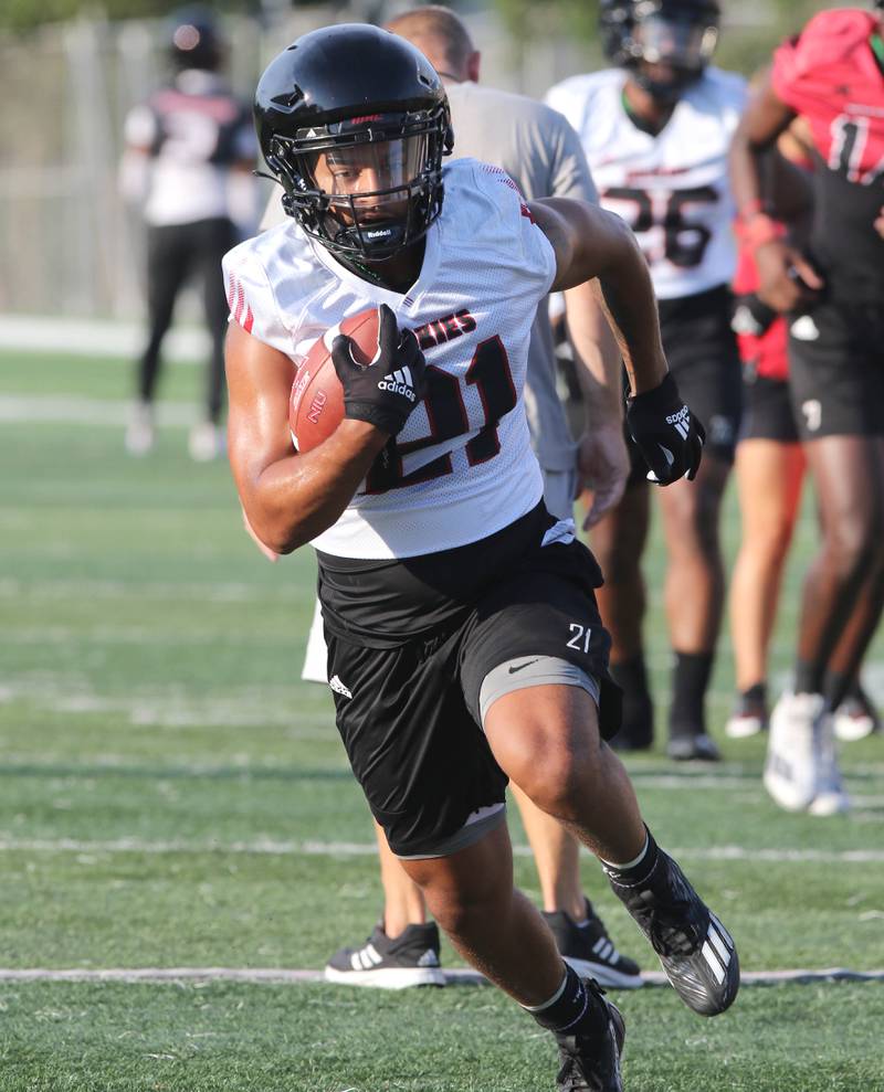 Northern Illinois Huskies running back Gavin Williams carries the ball during the teams first practice of the season Wednesday, Aug. 2, 2023, at Huskie Stadium in DeKalb.