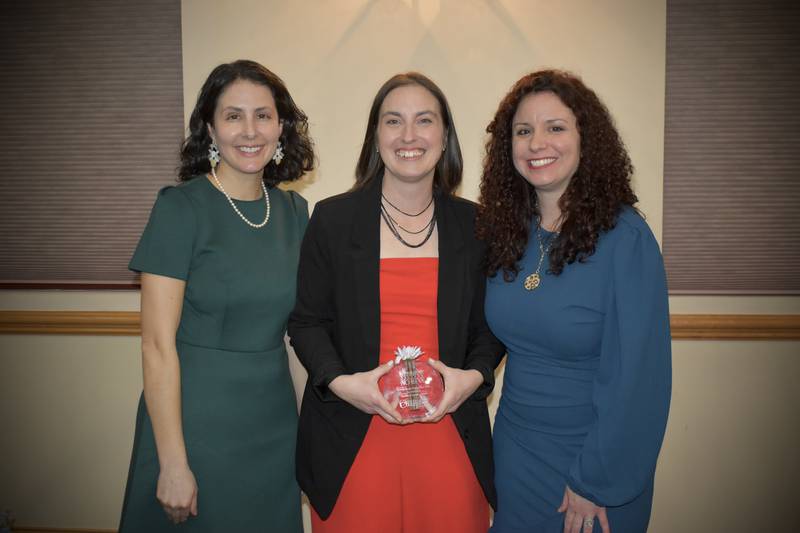 Sarah Beach (center) accepts the Entrepreneur of the Year award from the Grundy County Chamber of Commerce with Megan Borchers (left) and Christina Van Yperen.