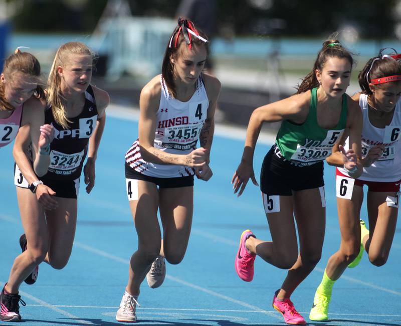 (Left to right) Prairie Ridge’s Rachel Soukup, Hinsdale Central’s Catie McCabe and York’s Bria Bennis take off for the 3A 1600-meter run during the IHSA State Track and Field Finals at Eastern Illinois University in Charleston on Saturday, May 20, 2023.