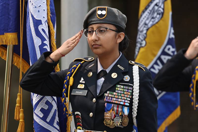 A member of the Joliet Central Army Junior ROTC salutes the flag at a special Flag Day ceremony dedicating a memorial to remember the 28 World War II Submarines that traveled through Joliet on their way to the Pacific theater in Bicentennial Park on Wednesday, June 14, 2023 in Joliet.