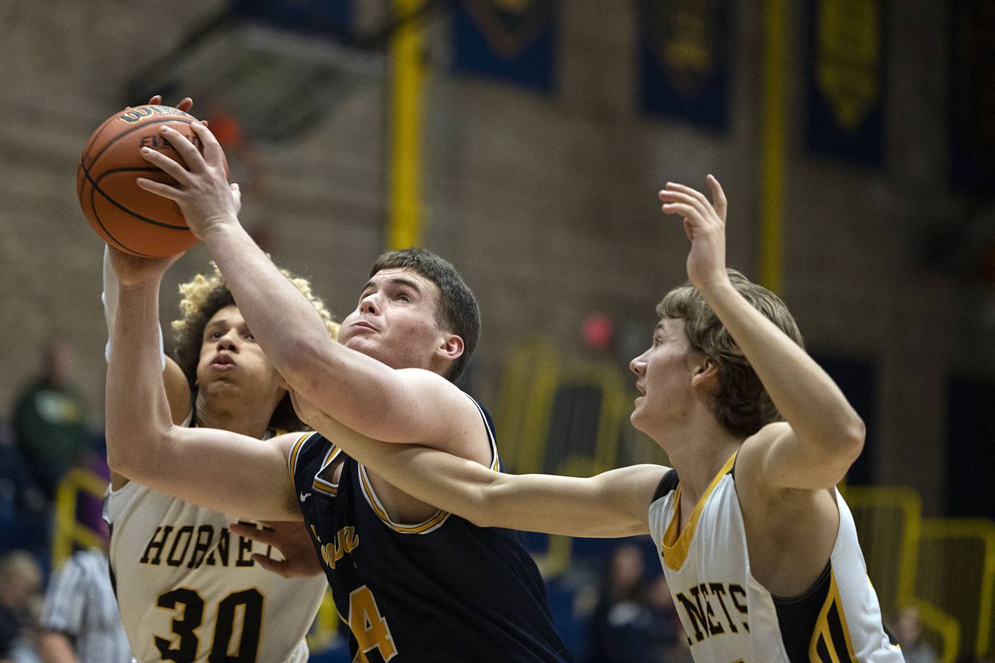 Sterling’s Lucas Austin works below the basket against Hinsdale South Monday, Jan. 16, 2023 at the Sterling MLK basketball tournament.