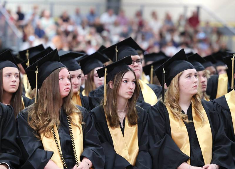 Graduation candidates along with friends and families listen to speakers during commencement ceremonies Sunday, May 28, 2023, at Sycamore High School.