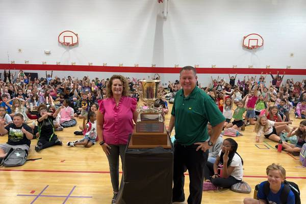 Bradley West administrator Jeff Voss celebrated at school after winning County Amateur Men’s Golf title
