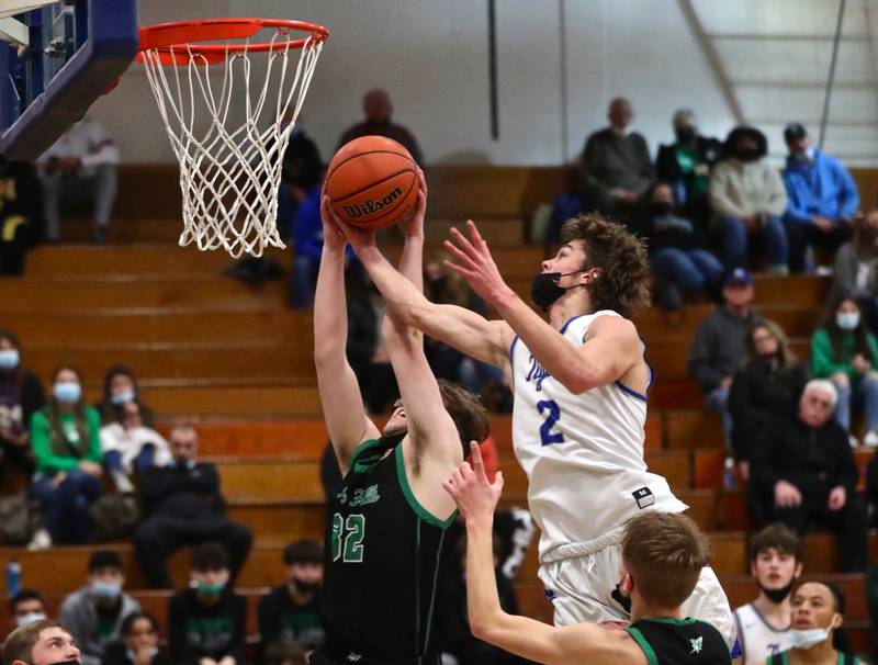 Princeton's Teegan Davis and Rock Falls' Chevy Bates battle for a rebound Saturday night at Prouty Gym.