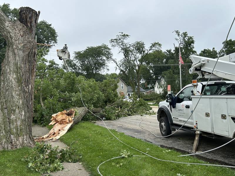 ComEd crews were busy Tuesday, July 16, 2024. repairing downed electrical lines and poles in Byron following Monday night's storm.