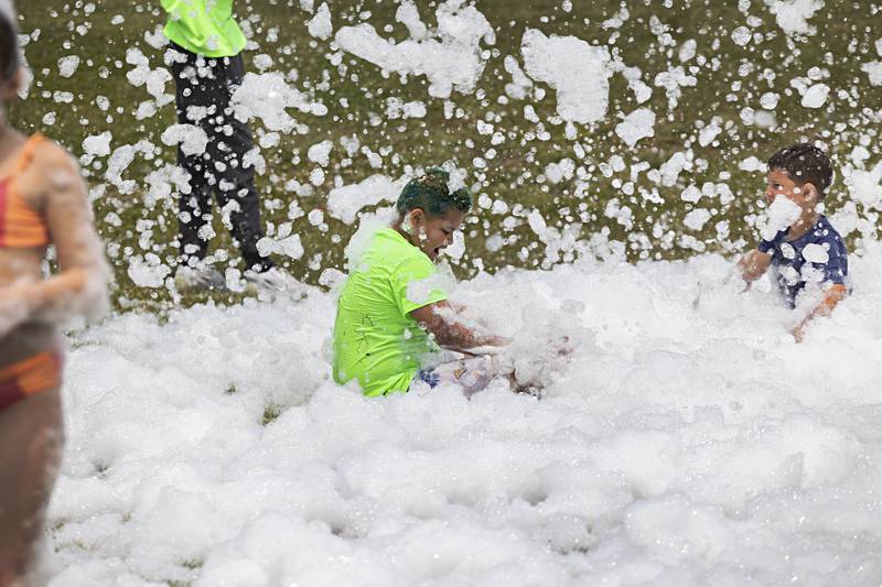 Dixon Park District SPARK campers were treated Thursday, June 15, 2023 to a foam machine on the grounds of The Facility as part of the day camp.