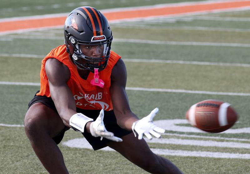 Dekalb’s Davon Grant catches a pass Monday, Aug. 12, 2024, at the school during the first practice of the regular season.