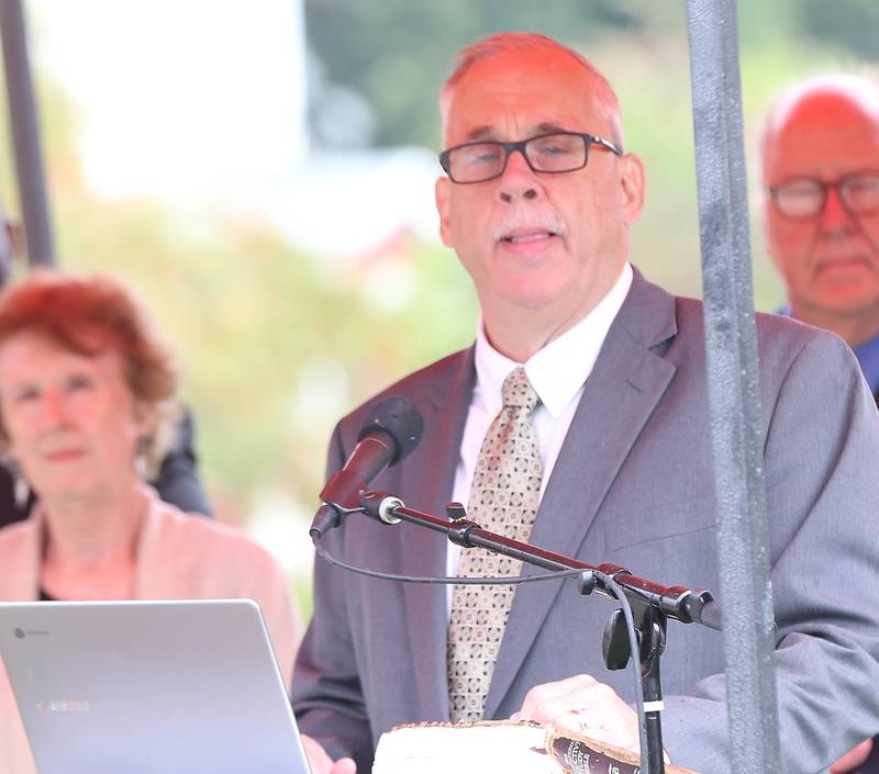 Dr. Michael Freeman, pastor of the Hampshire Colony Congregational Church gives the invocation during a Civil War Monument Ceremony on Friday, Sept. 22, 2023 outside the Sash Stalter Matson Building in Princeton.