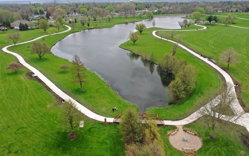 An aerial view of the walking path on Thursday, April 16, 2026 in Peru. The project is now complete and open to the public. Construction work began last October and included a 10-foot-wide concrete path, with secondary concrete paths also added, connecting the new parking lot near Lighted Way to the parking lot, playground, and shelter on the west side of Baker Lake. The new path is 2 feet than the current one.
