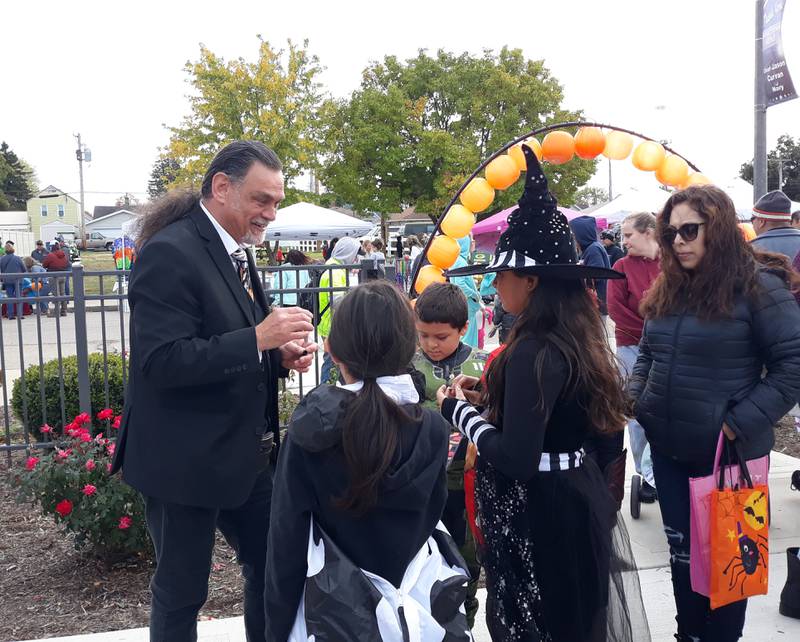Oglesby Harvest Fest wasn't all about treats, this magician shows some children some tricks Saturday, Oct. 16, 2022.