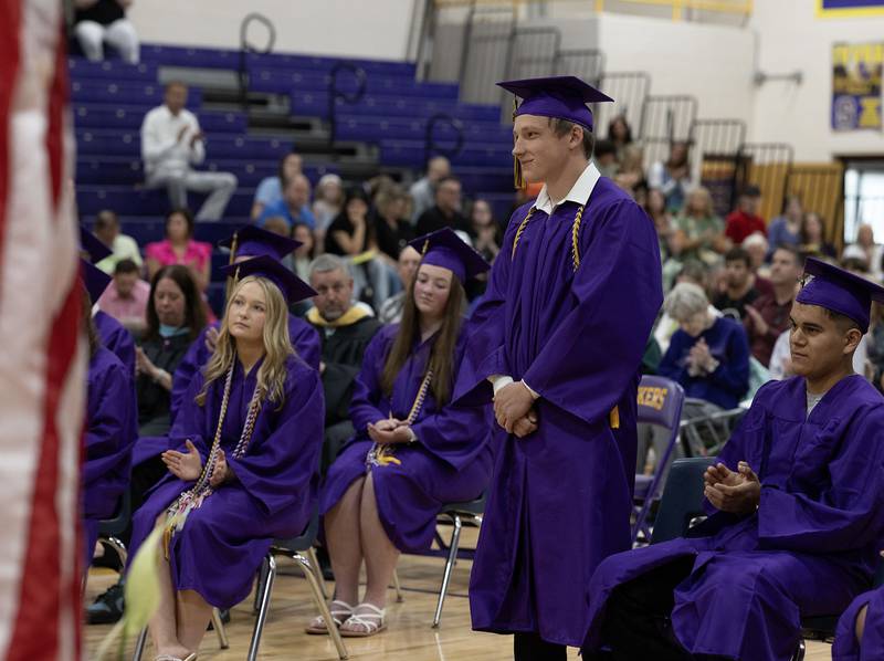 Serena High School Senior Class President Matthew Farrell, stands to be recognized for one of his achievements during Saturday's graduation ceremony on Saturday, May 24, 2025 at Serena High School.