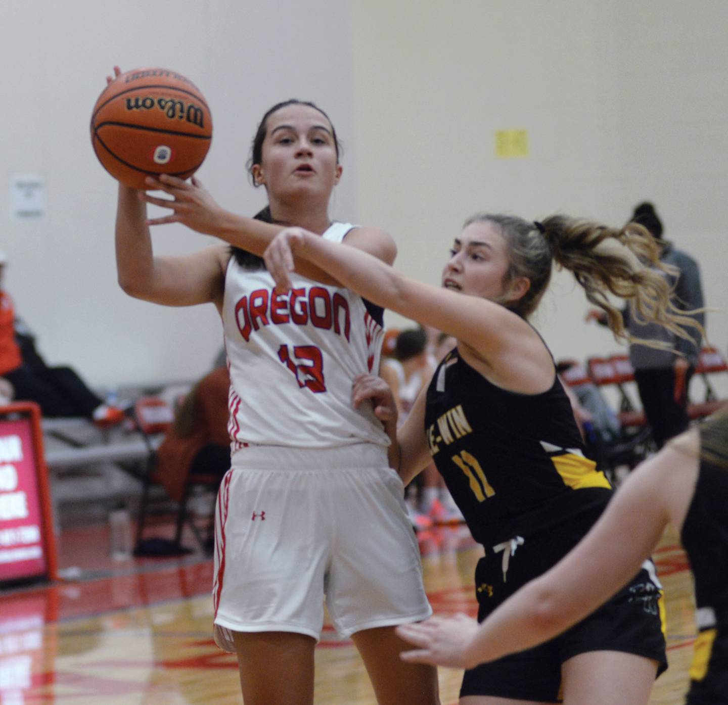 Oregon's Sarah Eckardt draws a foul as she shoots during a game with Lena-Winslow on Thursday, Nov. 16, 2023 at the Oregon Tip-Off Tournament at Oregon High School.