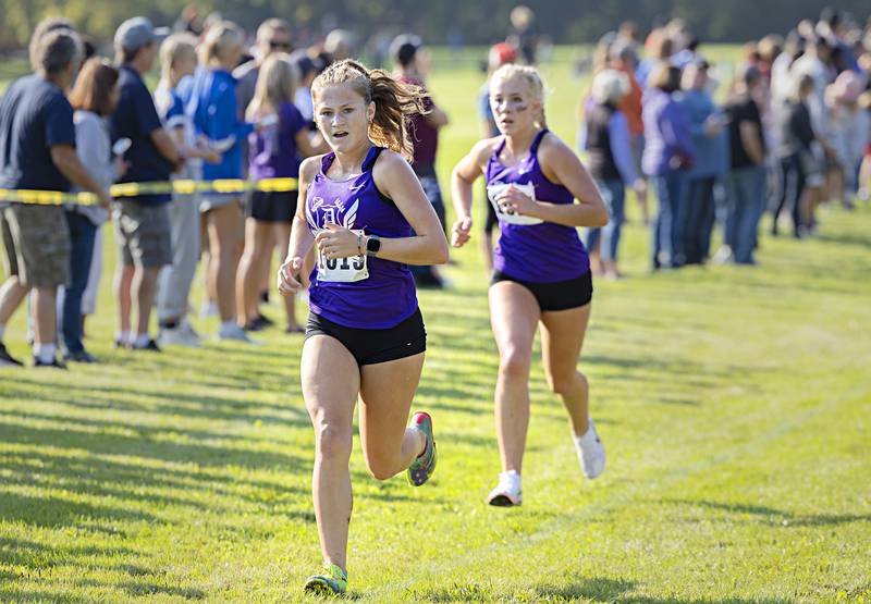 Dixon’s Kamryn Rogers leads teammate Emma Smith at the Rock River Run Saturday, Sept. 23, 2023 at Hoover Park in Sterling.