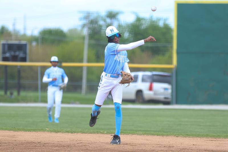 Nazareth’s Todd Dulaney Jr. throws to first for the out against Joliet Catholic on Wednesday, April 29, 2026 in Joliet.