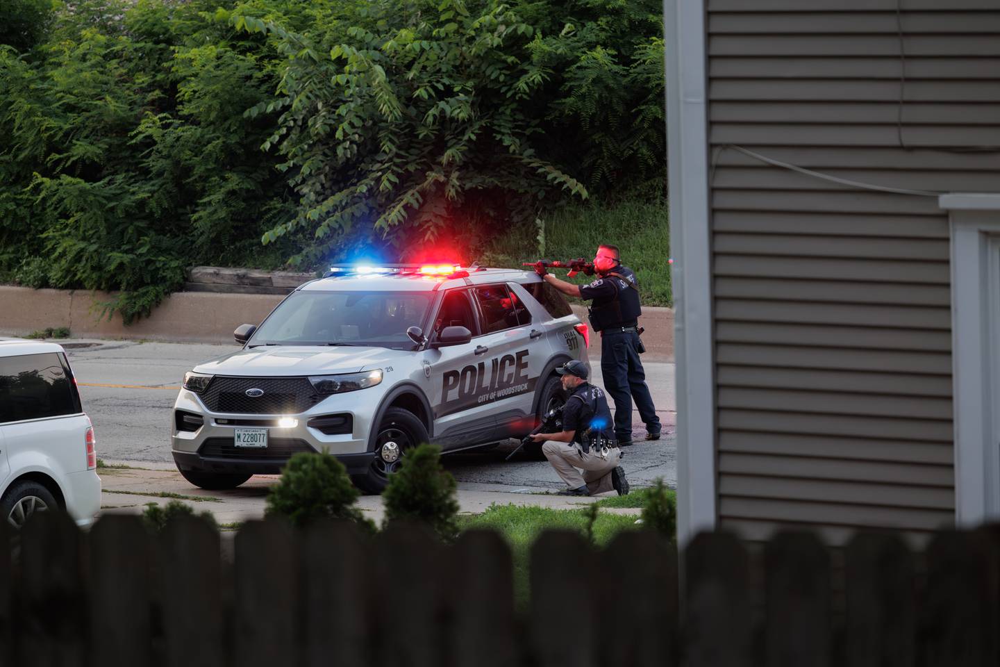 A Woodstock man was charged with illegally possessing three firearms after police and a SWAT team surrounded a home for five hours Wednesday Aug. 2, 2023.