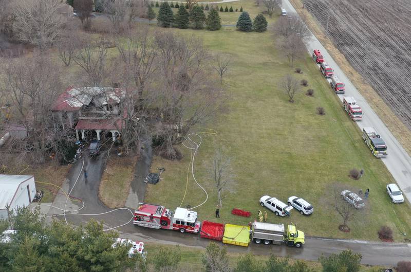 Firefighters work the scene of a structure fire on North 43rd road about a half mile west of the East 1st road intersection on Thursday, Jan. 2, 2024 in Mendota.