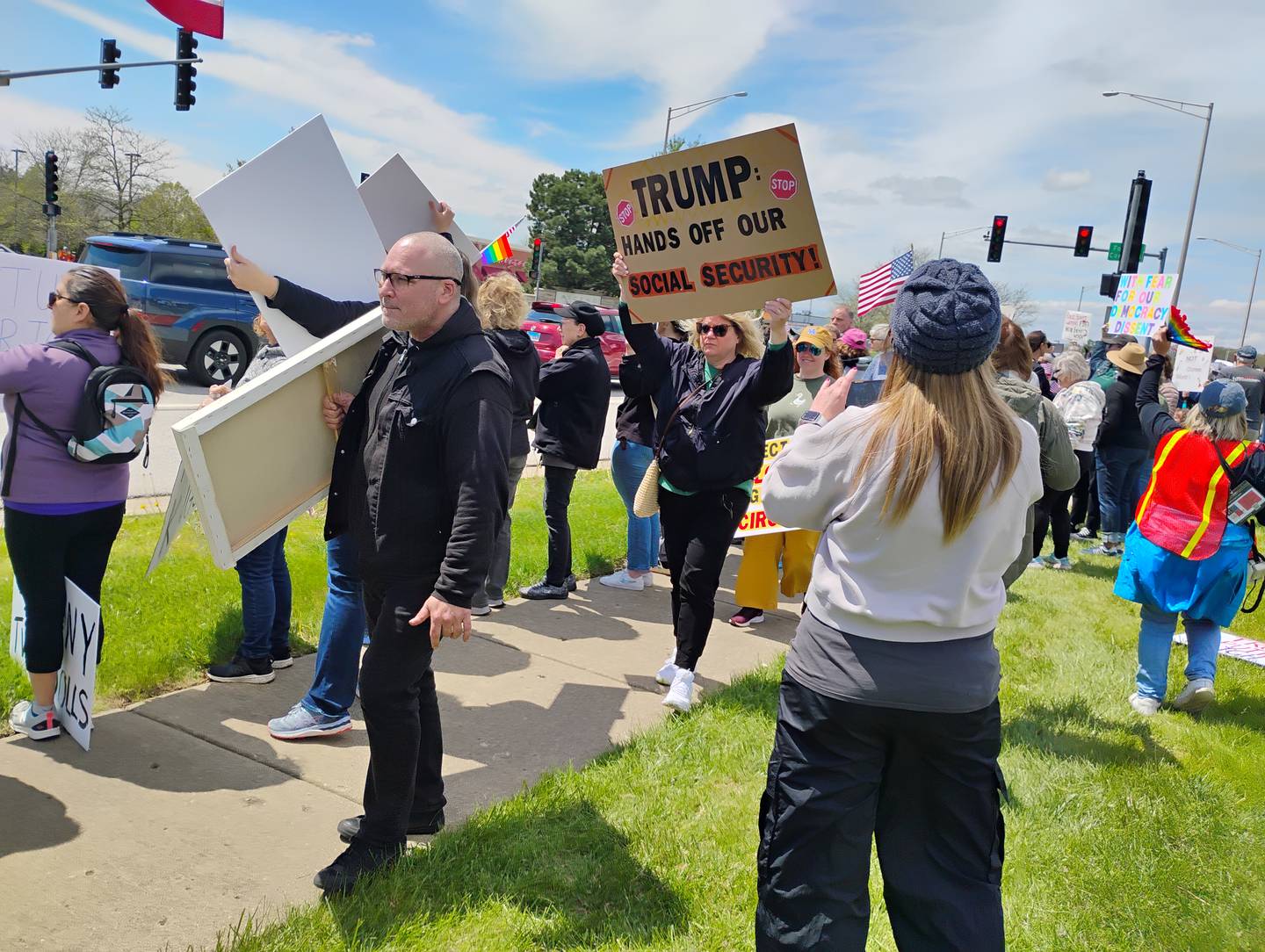 Thousands lined the street Saturday, May 3 in St. Charles for a Hands Off!! rally to protest President Trump and Elon Musk.