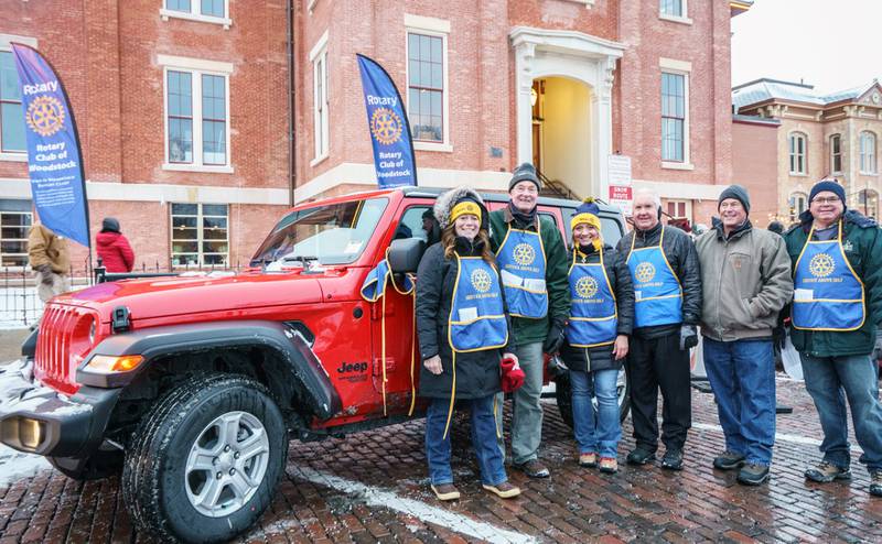 Members of Rotary Club of Woodstock shared information about and sold tickets for their second annual Jeep Raffle on the historic Woodstock Square during the yearly Groundhog Day Prognostication on Feb. 2, 2022.