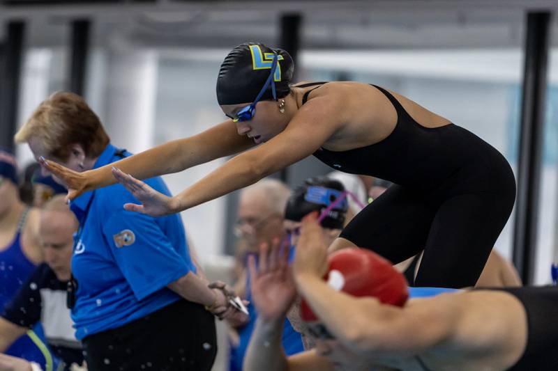 Lyons’s Dylan Jorgensen competes in the 200 Yard Medley Relay during the IHSA Girls State Swimming Preliminaries at FMC Natatorium in Westmont on Nov. 14, 2025.