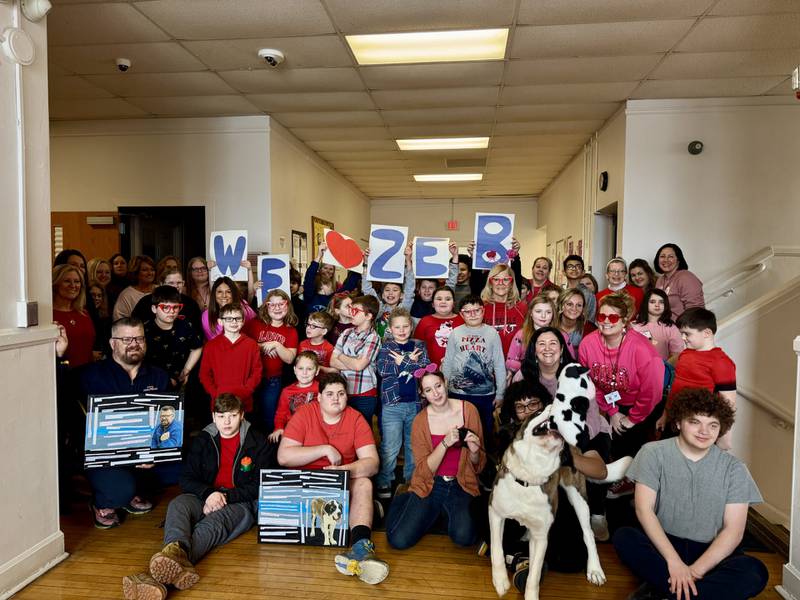 SRO Brian Zebron with students, faculty and staff from SOAR on Feb. 14, 2025 after his surprise for School Resource Officer appreciation day.