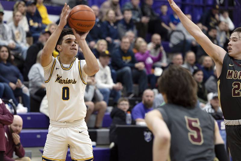 Sterling’s Andre Klaver puts up a three point shot against Morris Wednesday, Feb. 22, 2023 in the 3A sectional semifinal game.