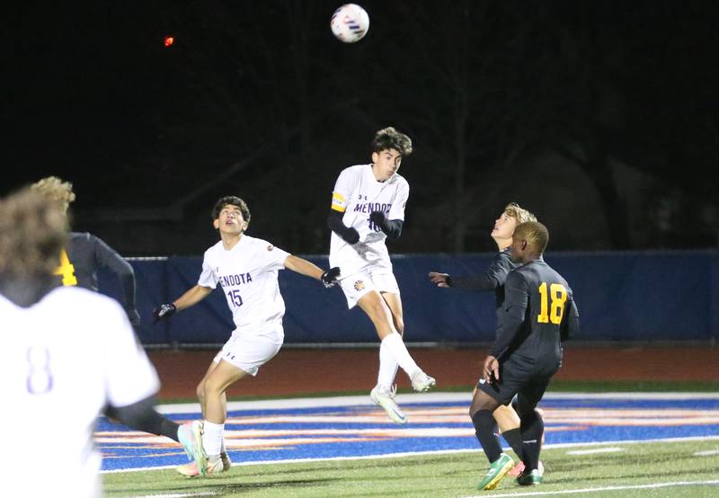 Mendota's Luis Ramirez and teammate Johan Cortez jump for a header in the box against Normal U-High defenders Luke Marshall and Kadin Rayford during the Class 1A State semifinal game on Thursday, Nov. 7, 2024 at Hoffman Estates High School.