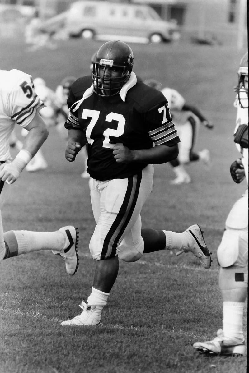 Chicago Bears lineman William Perry does warmup drills during training camp on Wednesday, June 12, 1985 in Platteville Wis.