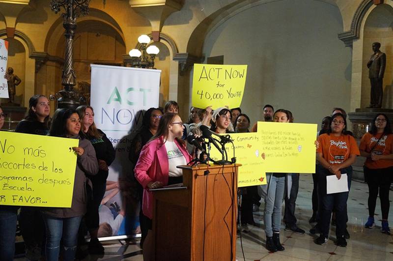 Susan Stanton, executive director of the advocacy group ACT Now, leads a rally calling on state lawmakers to provide funding to prevent after-school programs that serve an estimated 40,000 students statewide from being forced to close this summer.